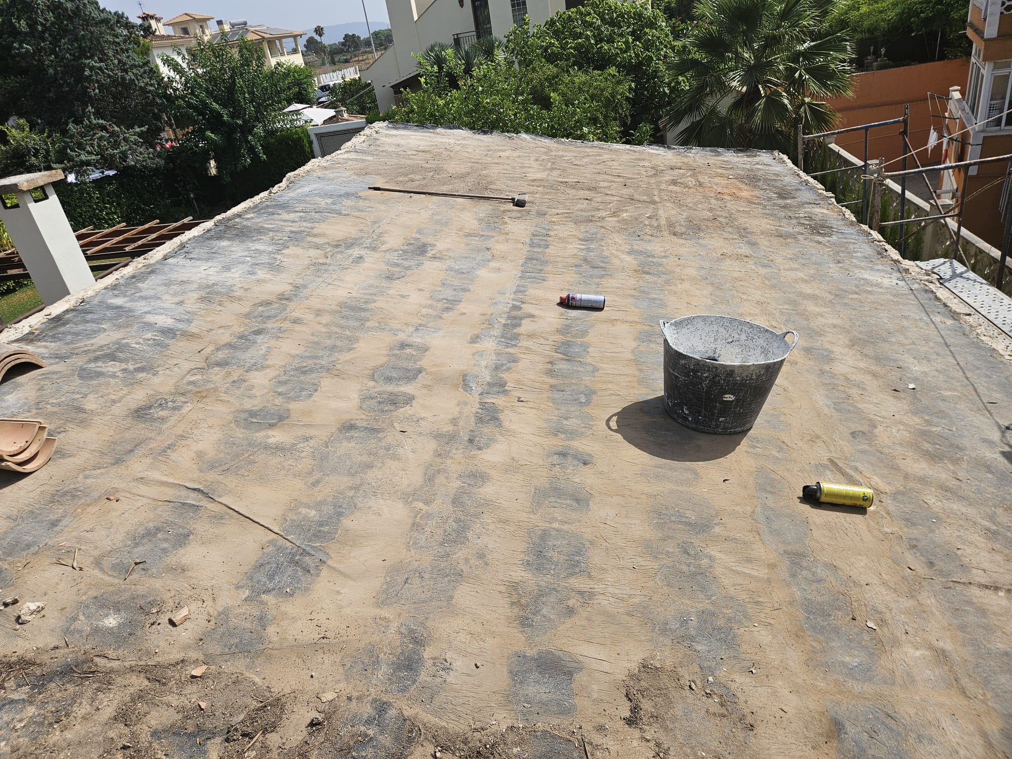 Flat roof stripped to bare base, prepared for waterproofing — roof renovation in Mallorca